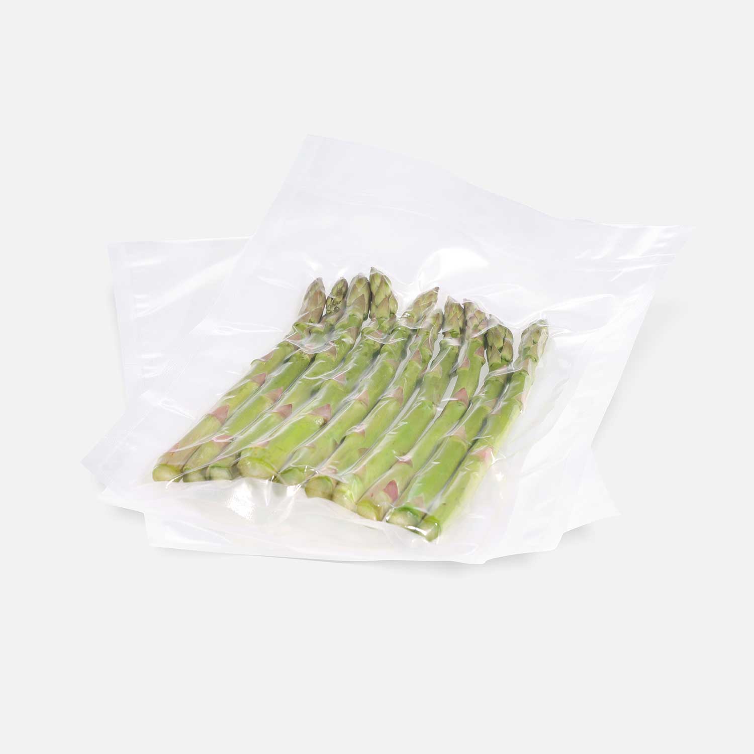 Structured vacuum bags with asparagus vacuum-sealed