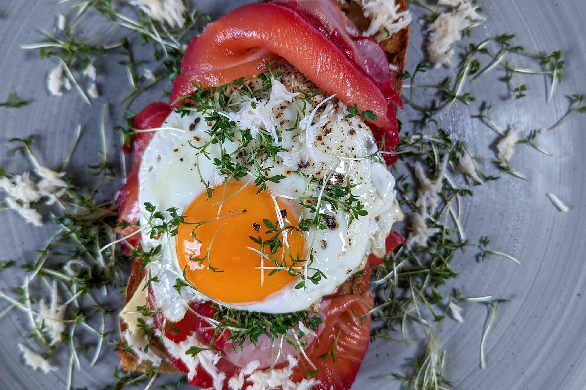 Pickled beetroot salmon served on bread