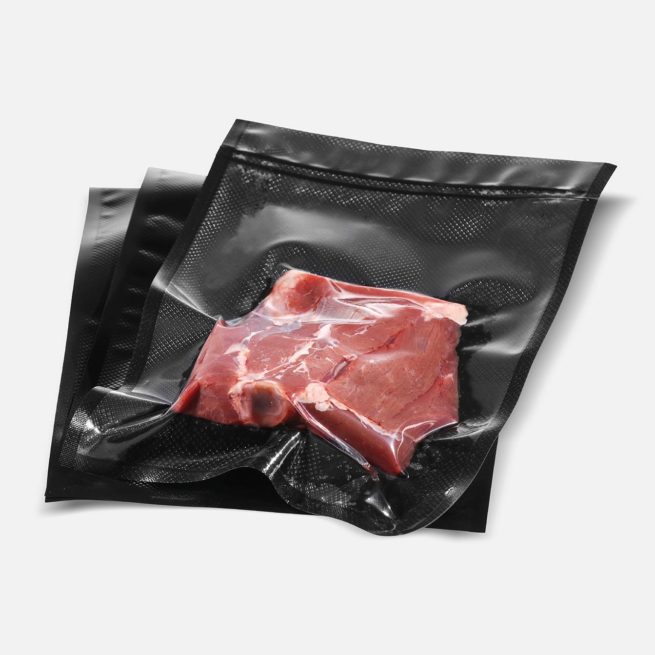 Meat Vacuum Bags with Black Background