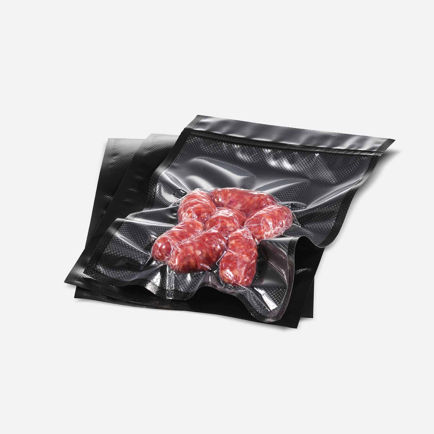 Black structured vacuum bags vacuum-sealed with Salsicca