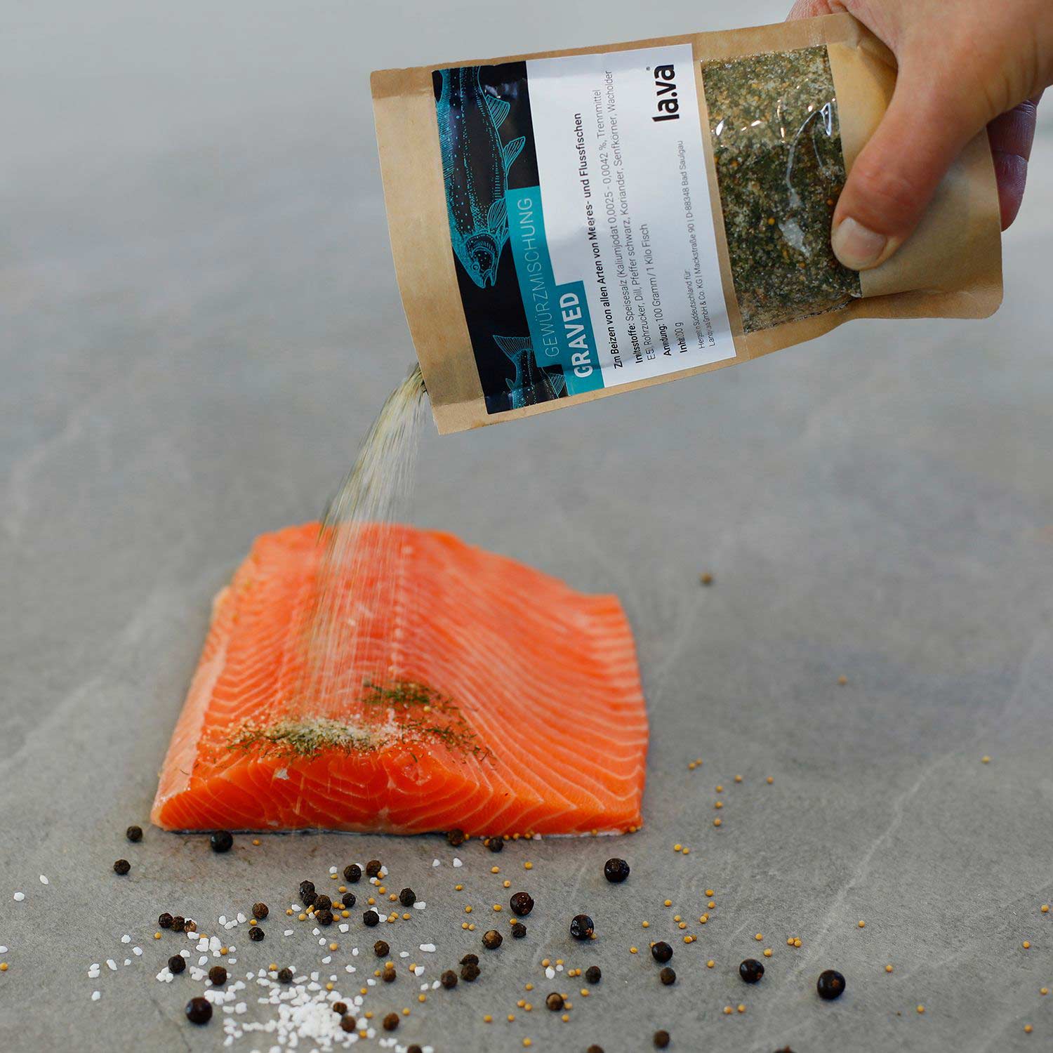 Gravlax seasoning mixture is applied to salmon fillet