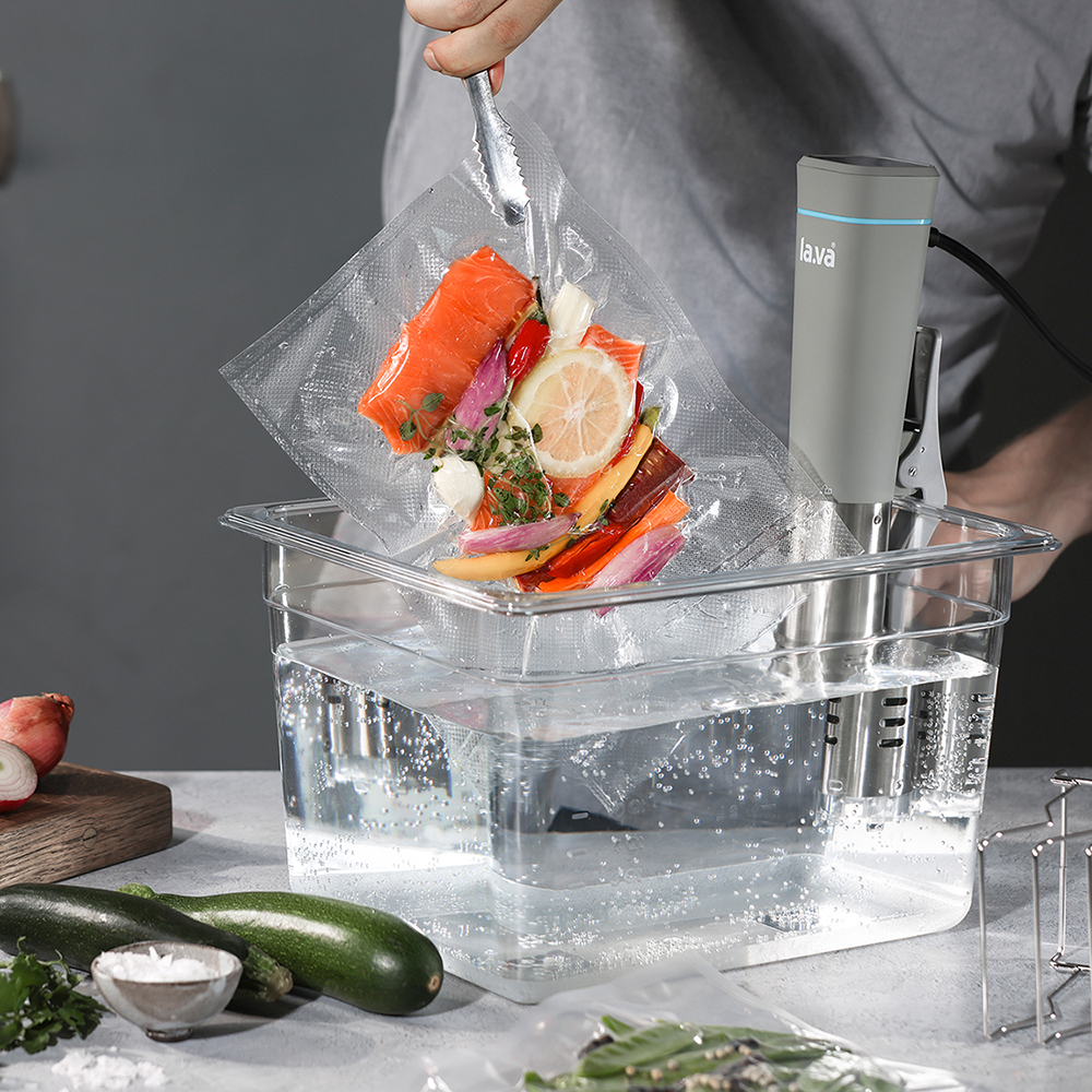 H-Vac vacuum cooking bag is taken out from the sous-vide bath