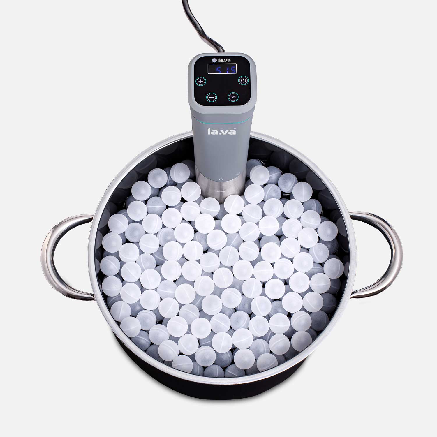 Sous-vide stick with insulation balls in a cooking pot