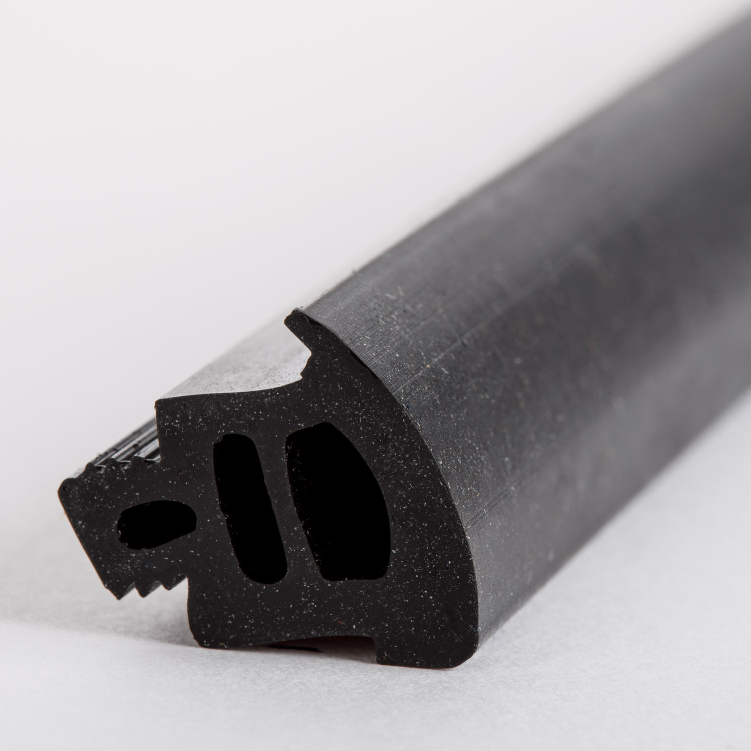 Detail of black hard rubber weld strip